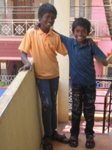 Two smiling brothers at Not Another Child Bangalore
