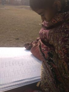 Indian girl concentrates on her studies