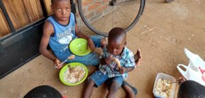 A group of children enjoying a meal