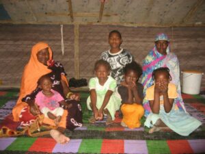 A family in Mauritania smiles for the camera