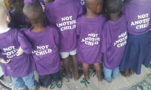 Children in Tanzania wearing the Not Another Child uniform