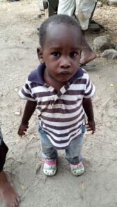 Tanzanian child curiously looking at the camera